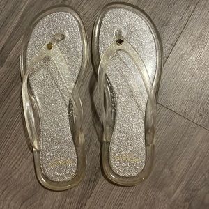 Womens Kate Spade clear jelly flip flops. Size 6.